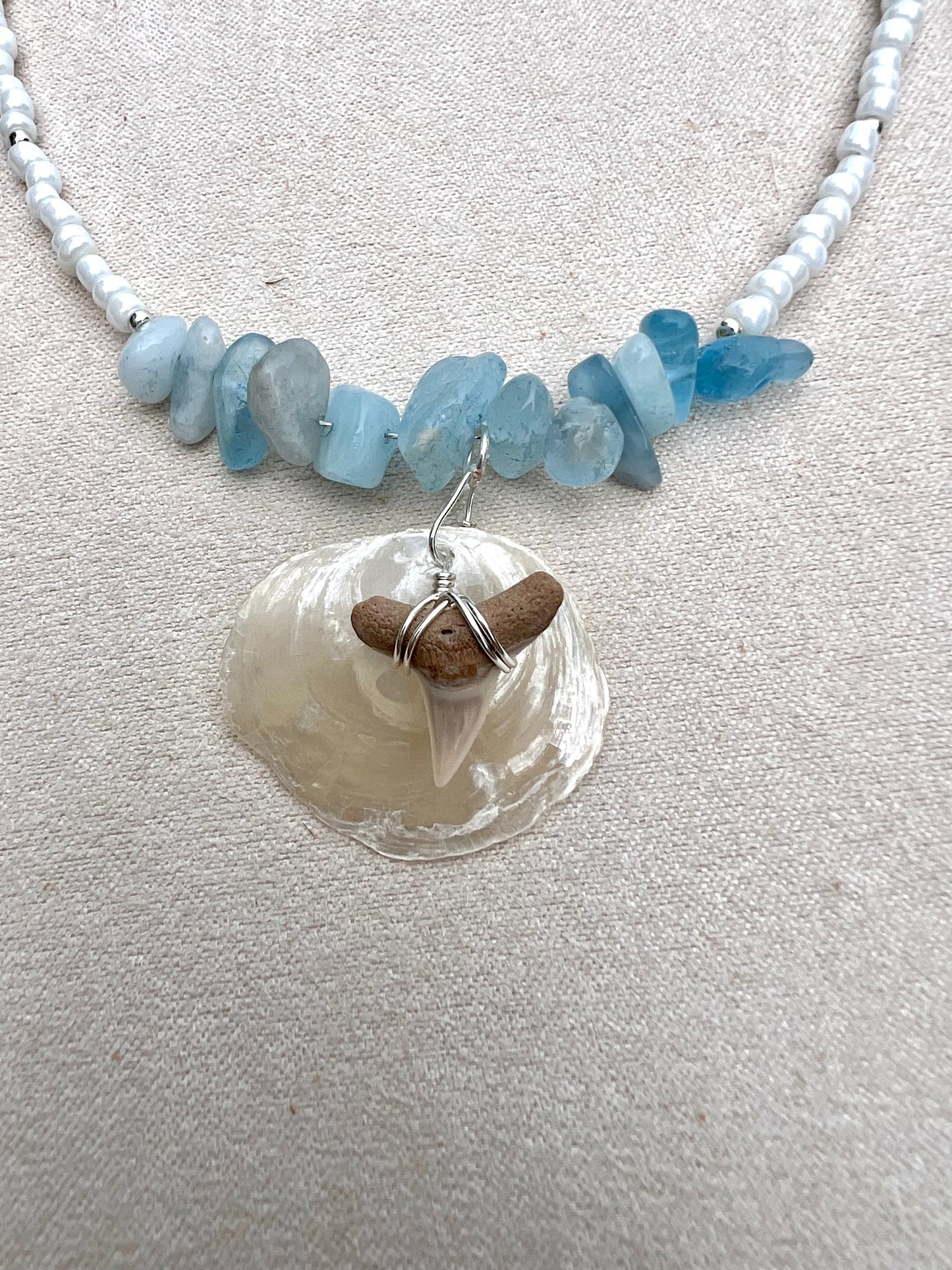 Ocean Spirit – Shark Tooth Necklace with Jingle Shell and Aquamarine Accents